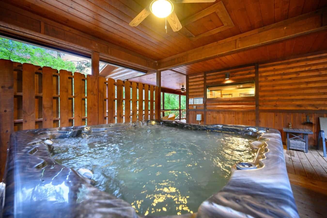 Nothing beats soaking in a hot tub surrounded by nothing but wood and trees while the whole place glows warm around you.