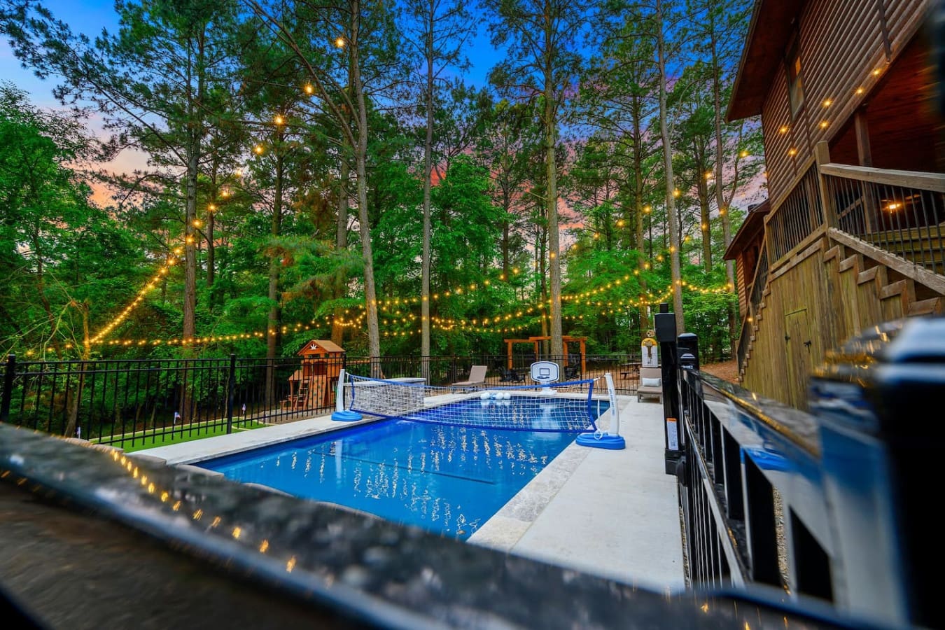 Nothing beats floating around in your own private pool while the sun sets through the trees and those fairy lights start doing their thing overhead.