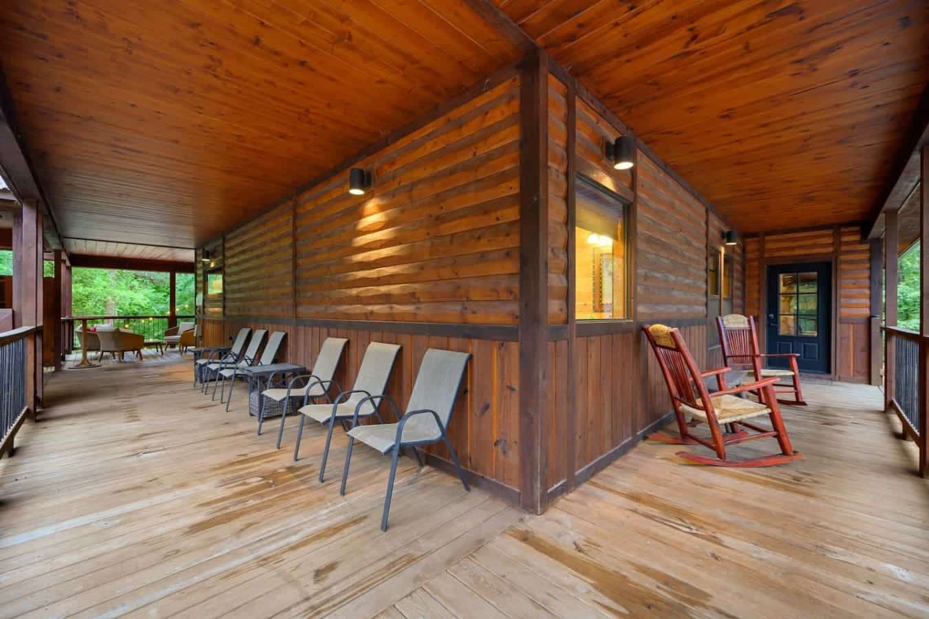 This wrap-around deck is basically your own private outdoor living room, with enough seating scattered around that your whole crew can spread out and chill without anyone getting in anyone else's way.