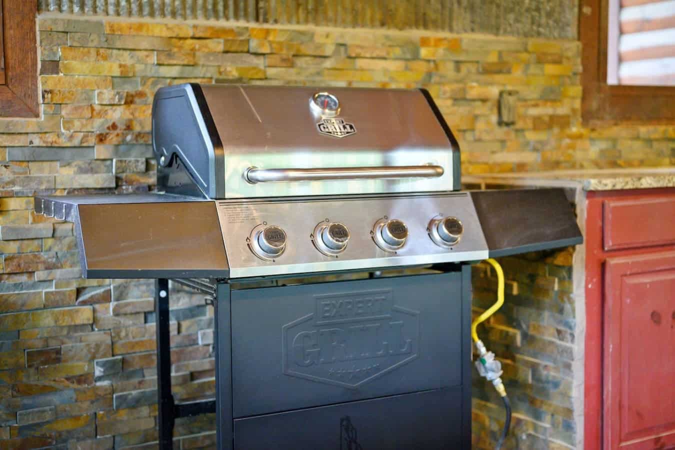 This grill's basically your ticket to not cooking inside, which honestly might be the best part of renting a place like this.