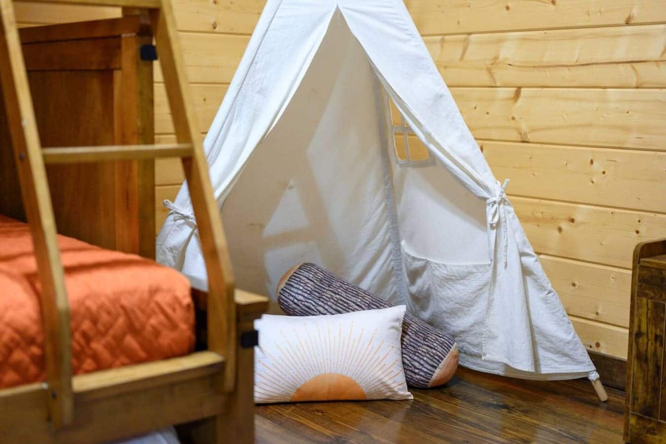 This teepee's basically the coolest fort you'll build all week—cozy enough for an actual nap, positioned right in the middle of the action so nobody feels left out, and honestly kind of making everyone jealous they didn't call dibs first.