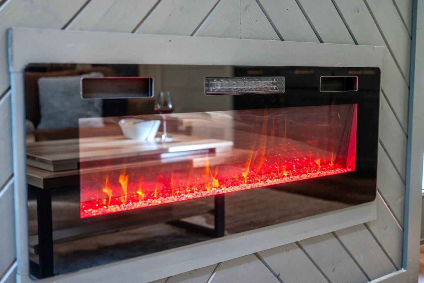 Nothing says "cozy night in" quite like curling up in front of this electric fireplace while the glow does all the heavy lifting on the ambiance.