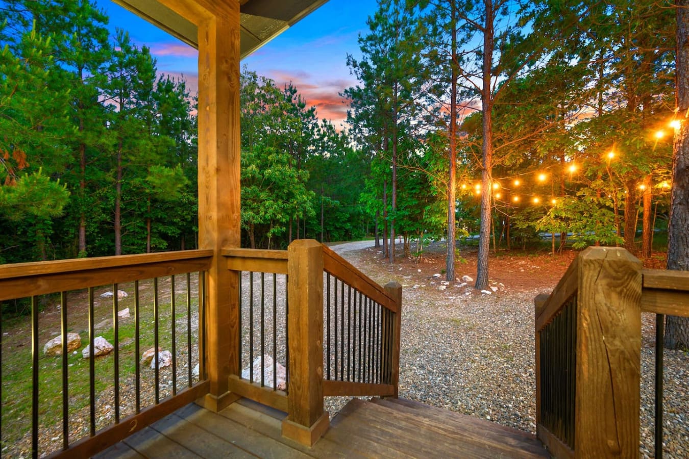 Standing on this deck as the forest lights up and the sky shifts from blue to pink feels like you've stepped into your own private slice of magic.