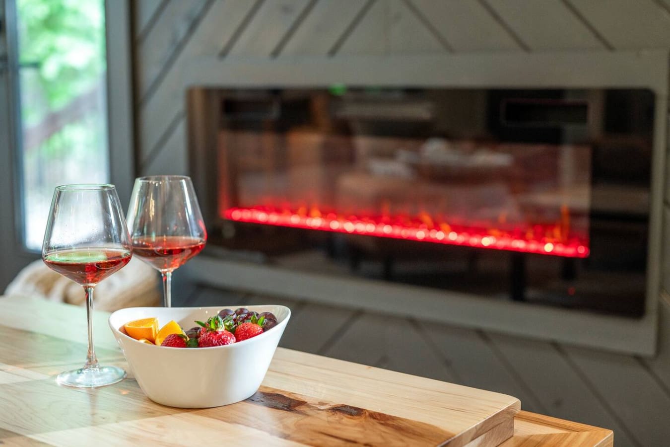 Picture this: you're curled up by the fireplace with a view of the backyard, and suddenly your whole vacation just got a whole lot cozier.