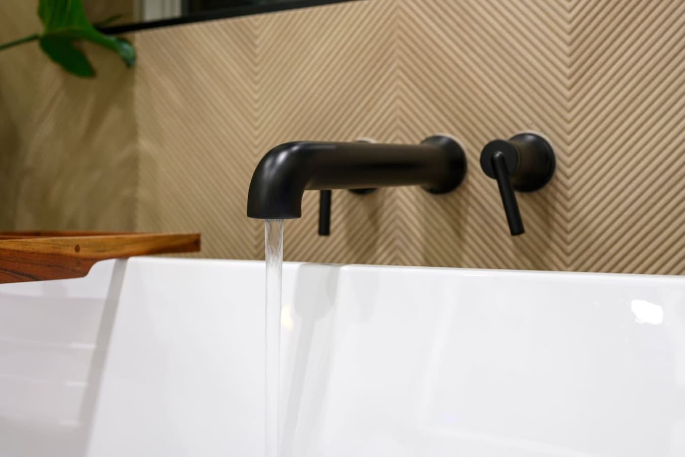 This sleek black faucet is basically the cherry on top of a bathroom that actually makes you want to linger and take your time getting ready.