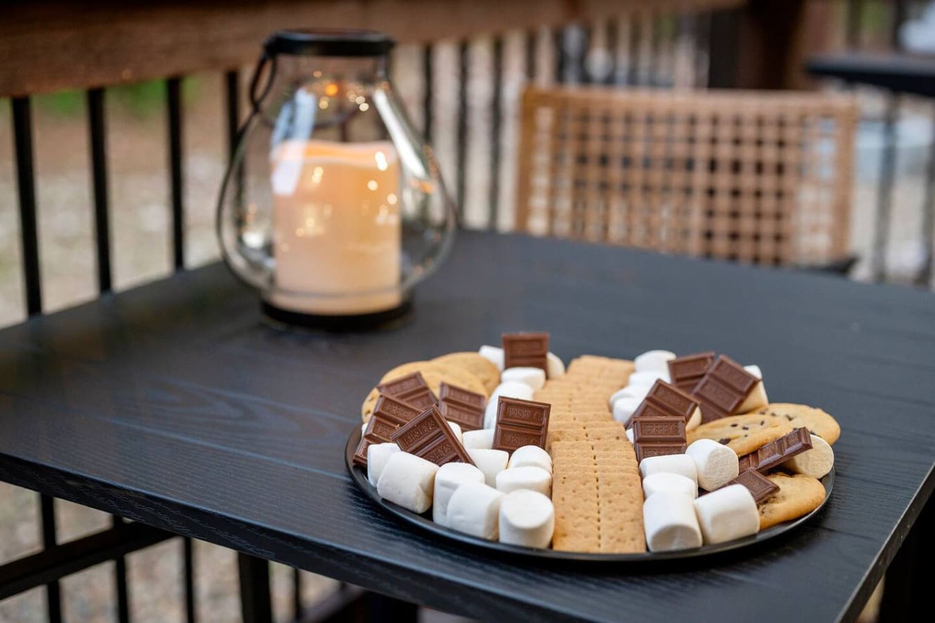 Your deck setup is literally begging you to stay out here until the stars come out and make s'mores happen.