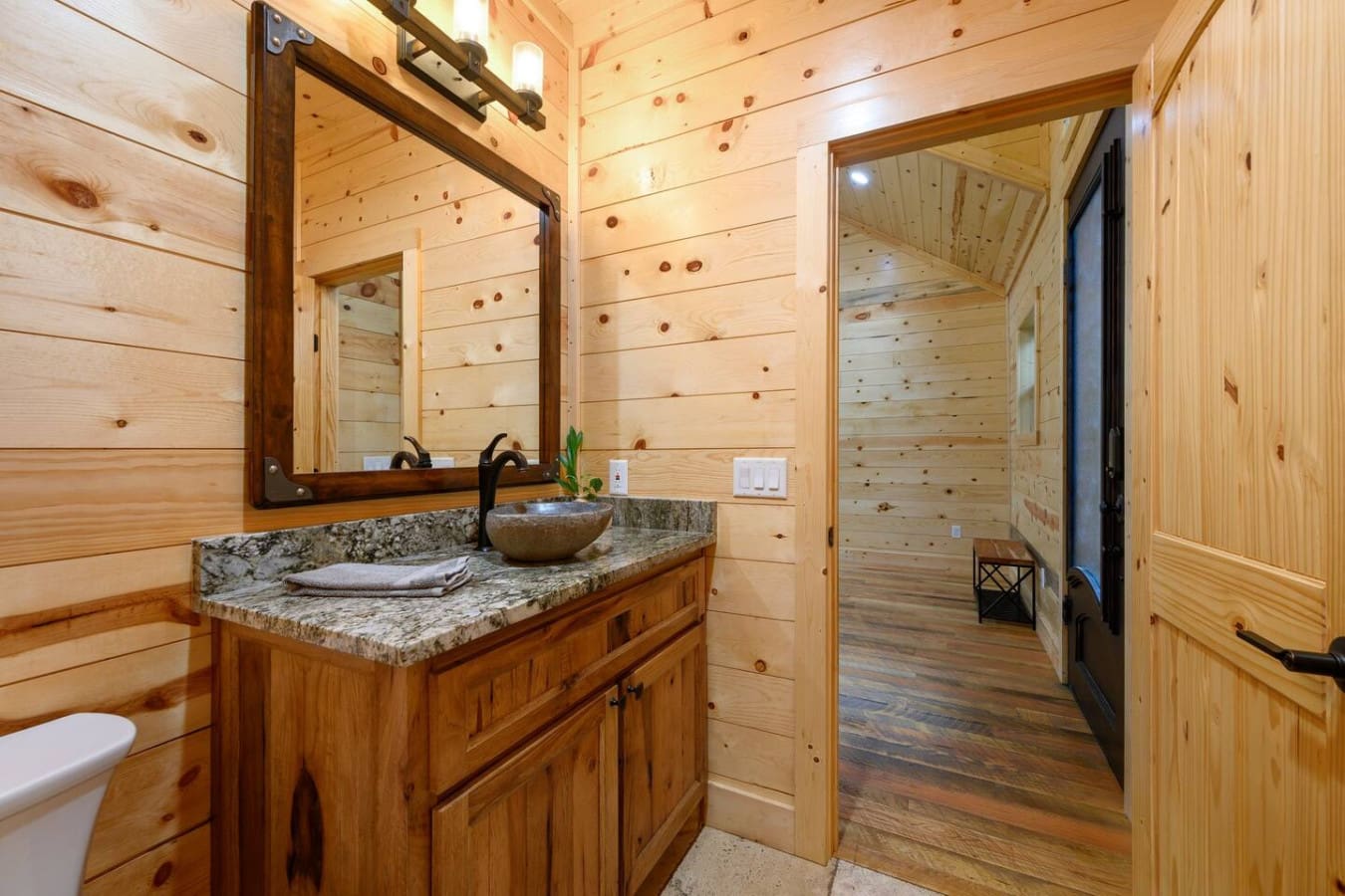 Rustic elegance, even in the bathroom.