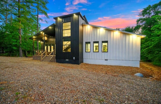 Modern elegance in the woods—where crisp lines meet soft skies and quiet moments begin.