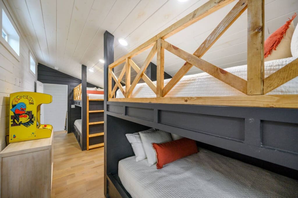 Sleep, play, repeat. This bunk room brings the nostalgia and the cozy vibes.