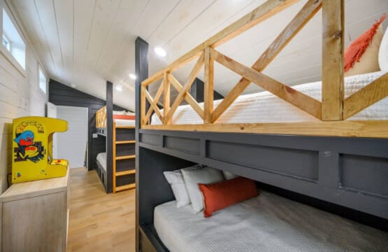 Sleep, play, repeat. This bunk room brings the nostalgia and the cozy vibes.