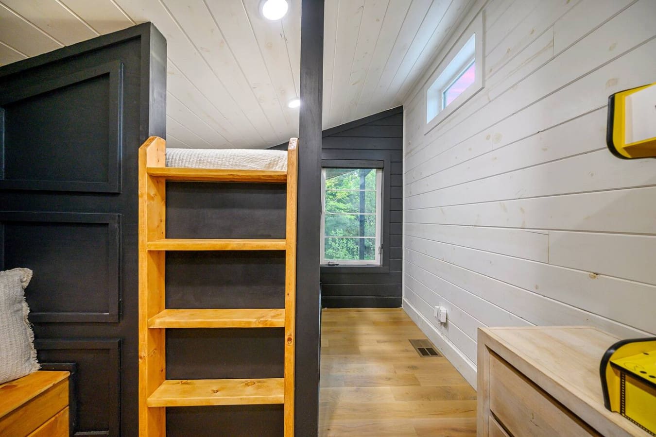 Rustic charm meets playful touches—this cozy nook is made for unwinding after a day of adventure.