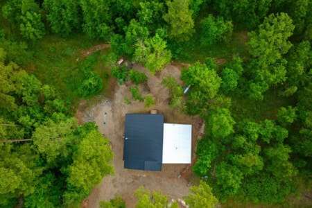 Tucked away in nature’s embrace—your private escape beneath the trees.