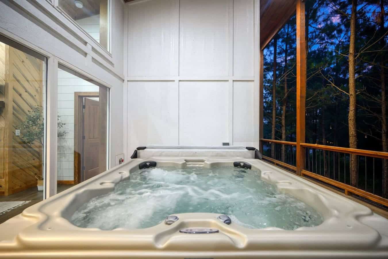 Let the bubbles melt your stress away in this forest-view hot tub hideaway.