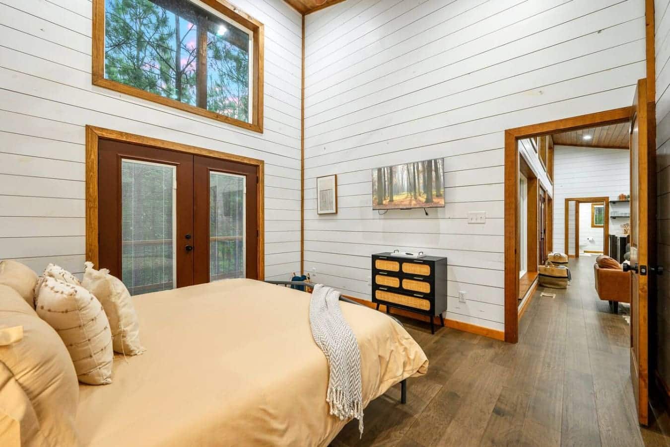 Wake up to forest views and vaulted ceilings