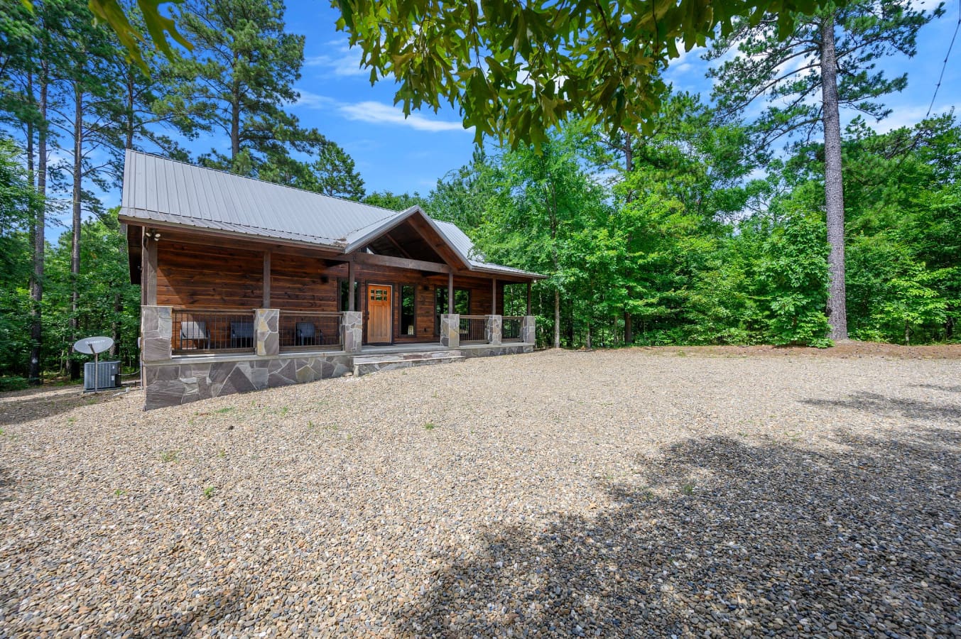 From the gravel drive to the timber frame—this cabin looks just as stunning outside.