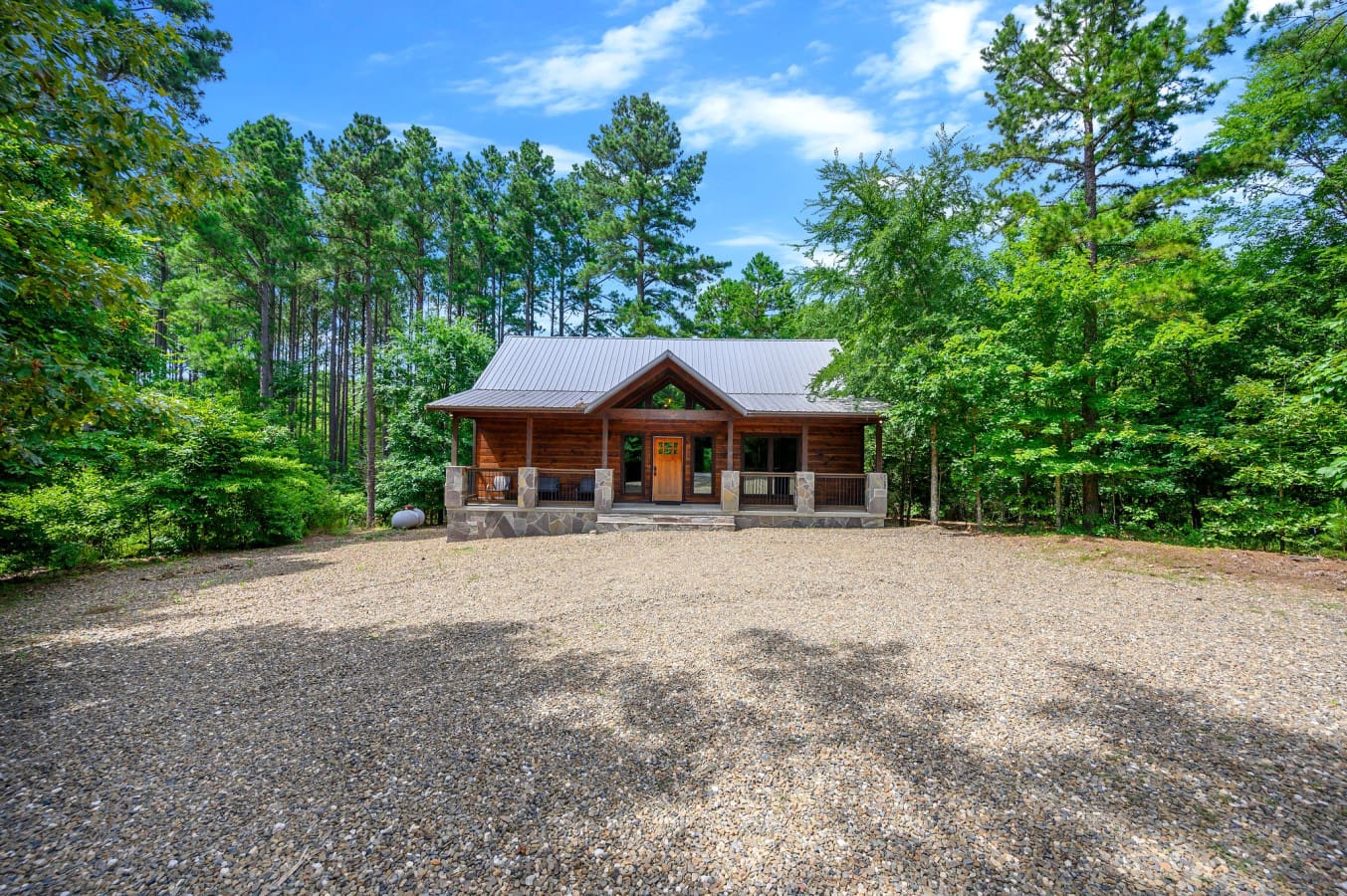 Wide open skies and tall pines set the stage for your stay.