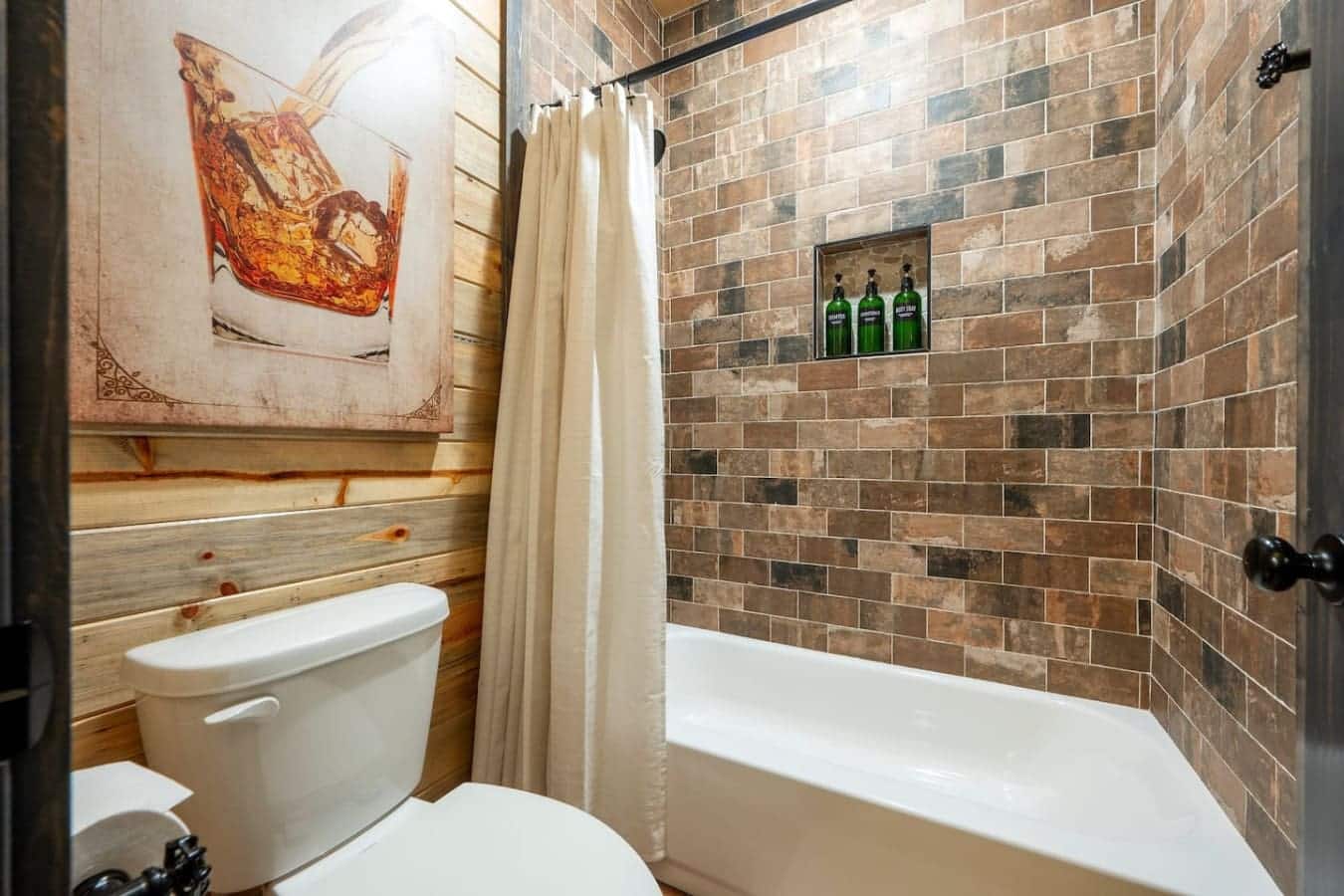 Soak away the day in this warm, whiskey-toned hideaway.
