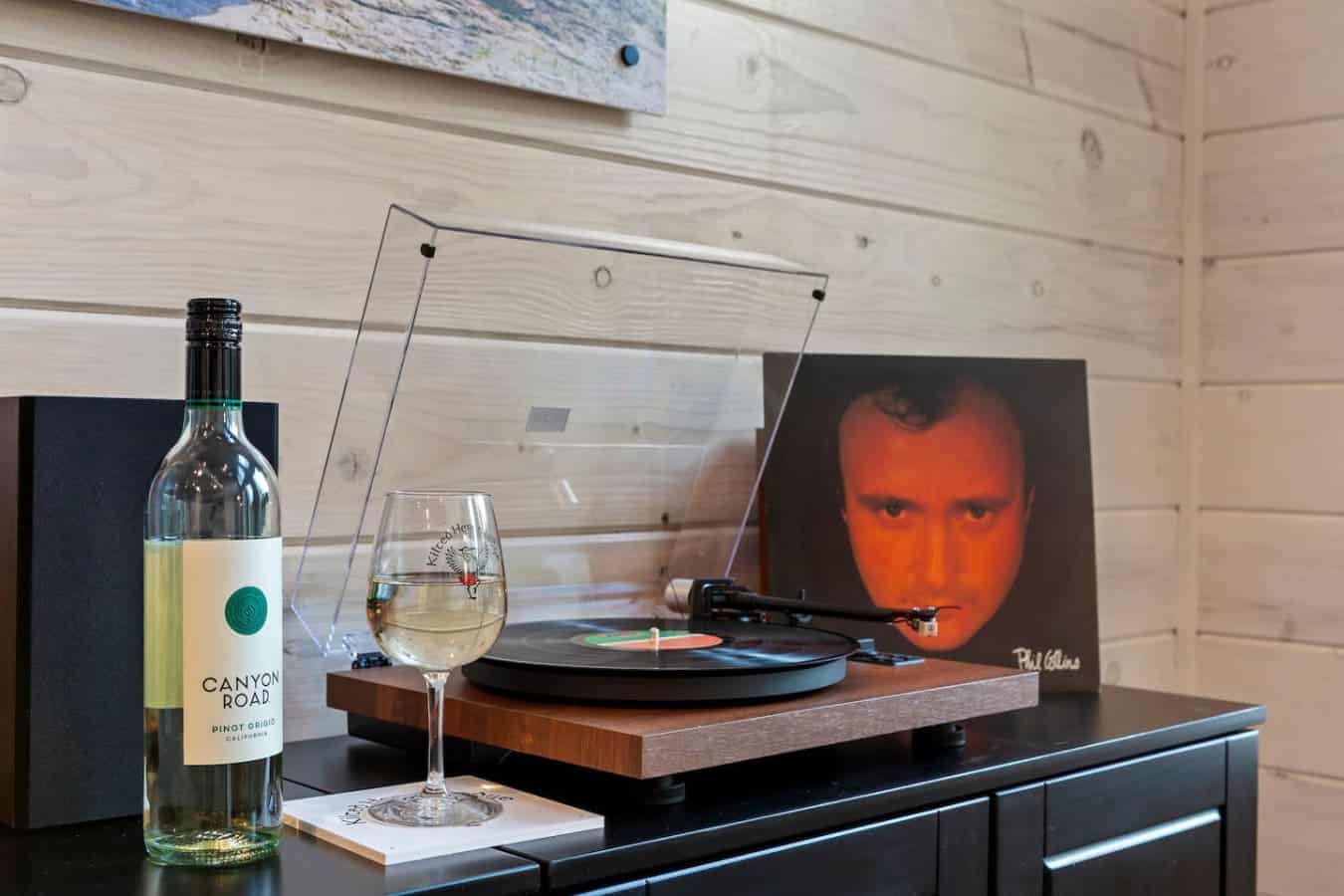 Pinot Grigio, Phil Collins, and the crackle of vinyl