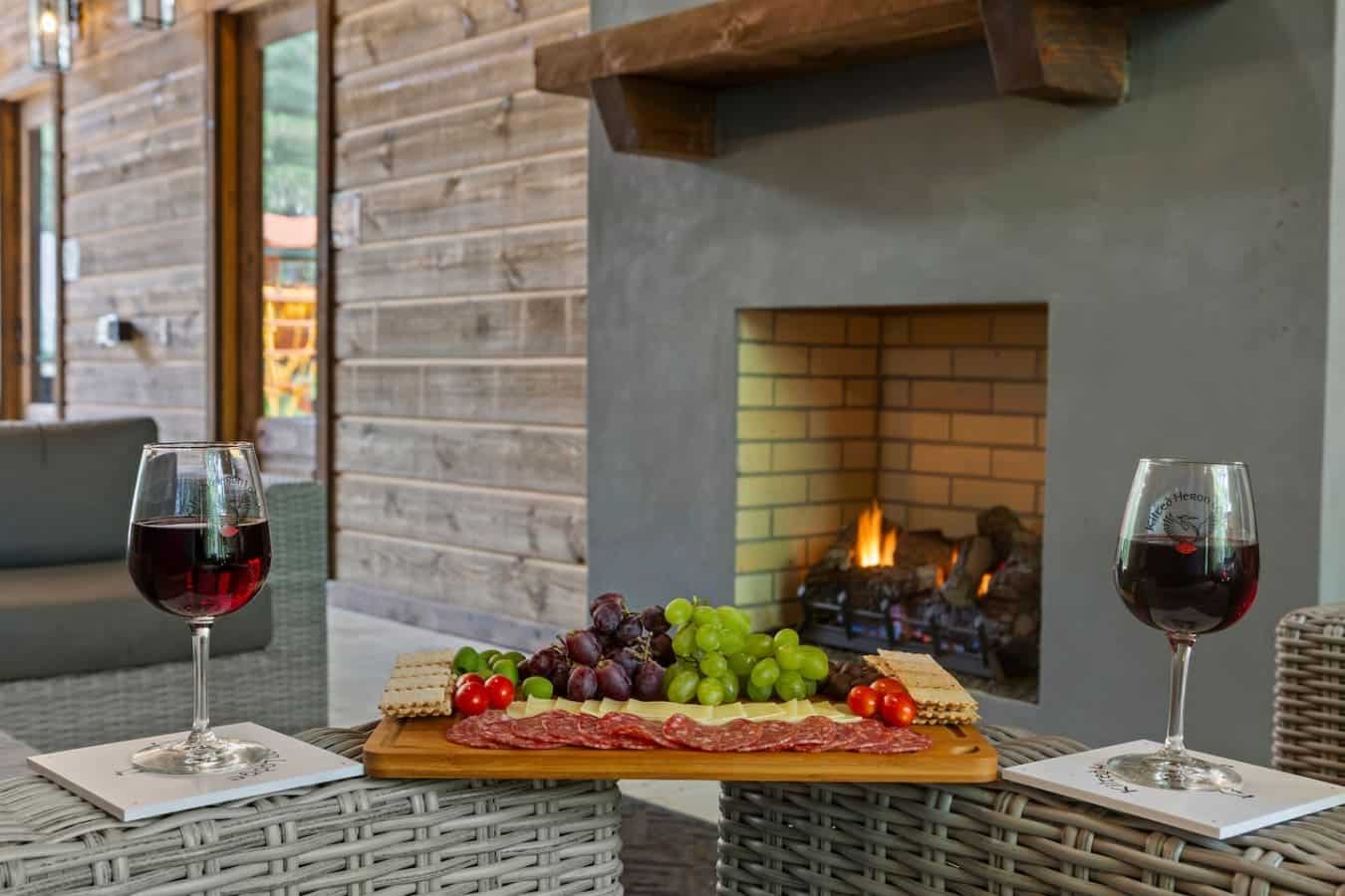 Luxury lives in the details: cozy fire, artisanal bites, and mountain air.
