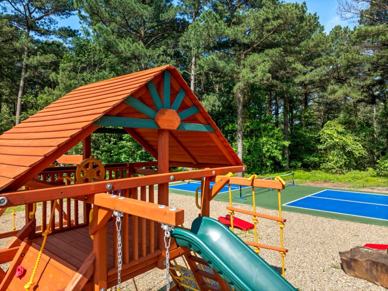 A playground for the kids, a court for the grown-ups—and smiles all around.