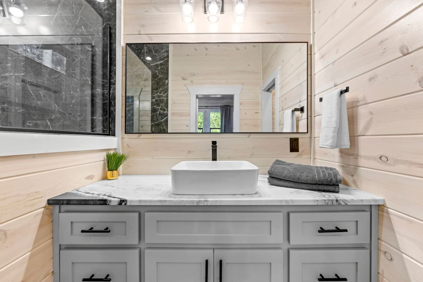 Refresh and unwind in this spa-inspired bathroom- where every detail feels like home.
