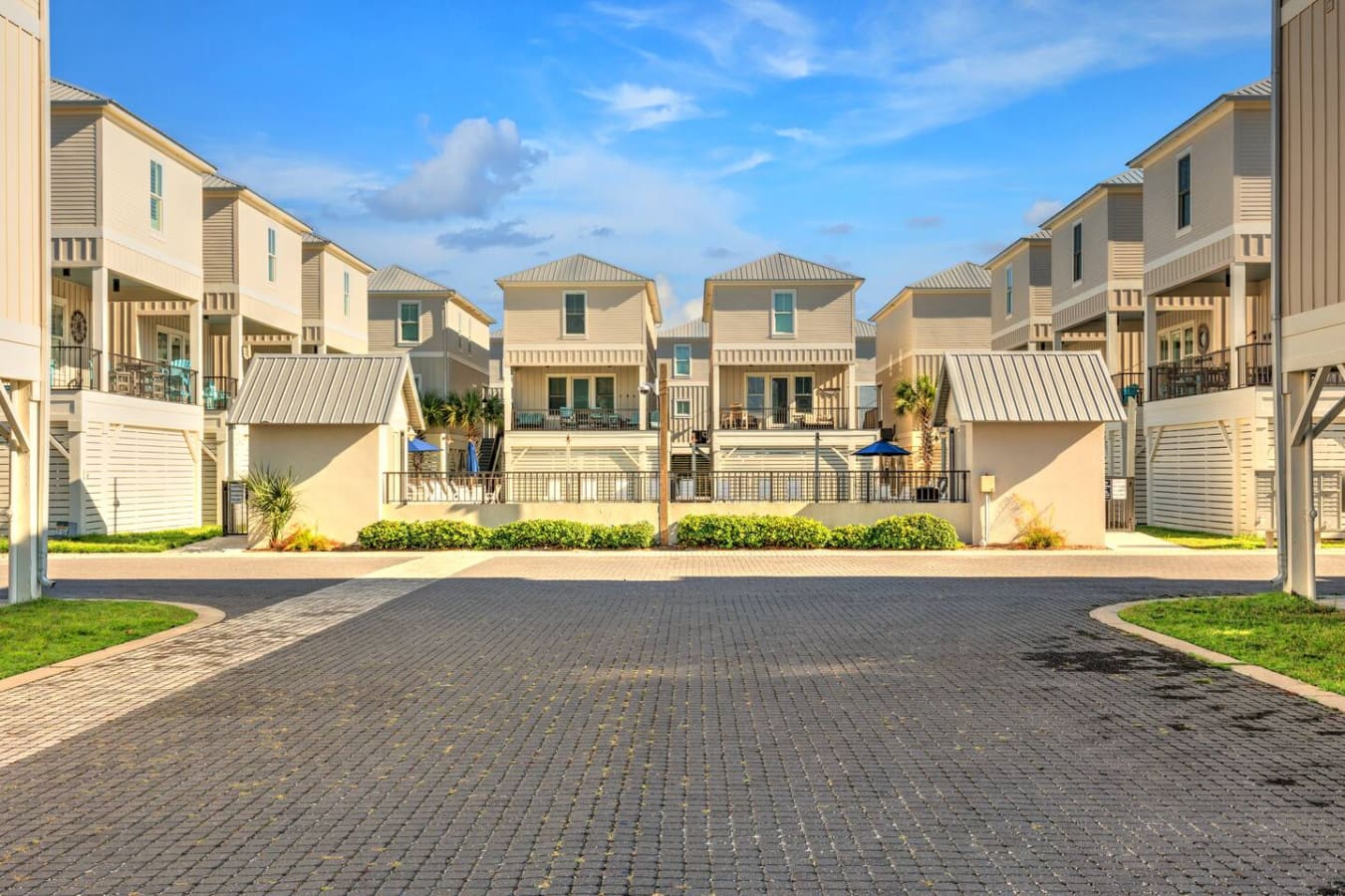 These cheerful beach cottages are lined up perfectly so you can walk straight out your door and be in the middle of everything—the vibe, the views, the whole reason you came here in the first place.