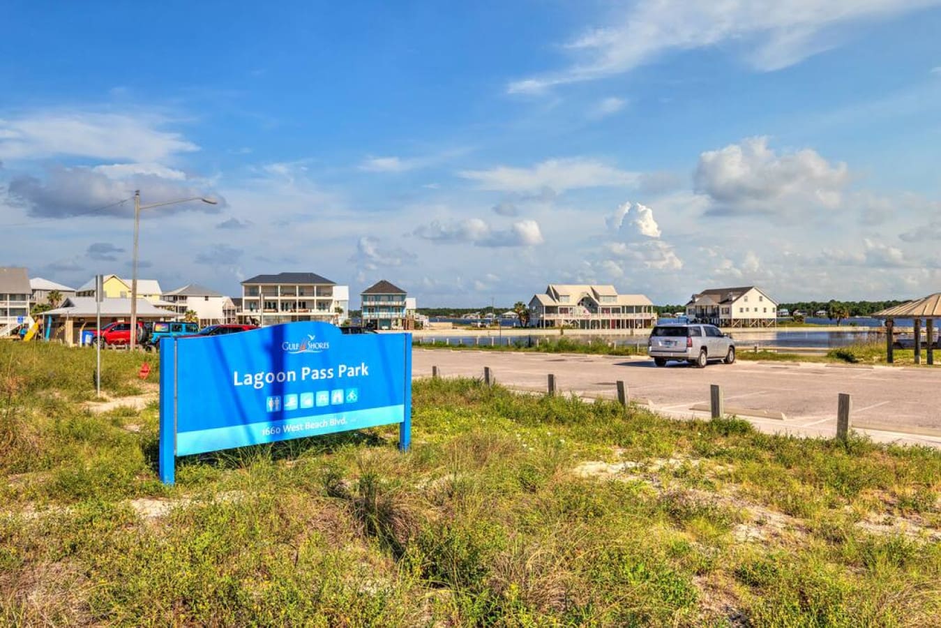 Welcome to Lagoon Pass Park, where you're literally steps away from waterfront living and those classic Outer Banks stilted homes that make every sunset feel like the whole point of the trip.