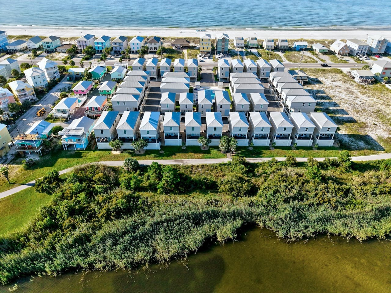 From this angle, you can really see how this little beach community basically has it all—cozy houses with character, a salt marsh buffer, and the ocean practically in your backyard.