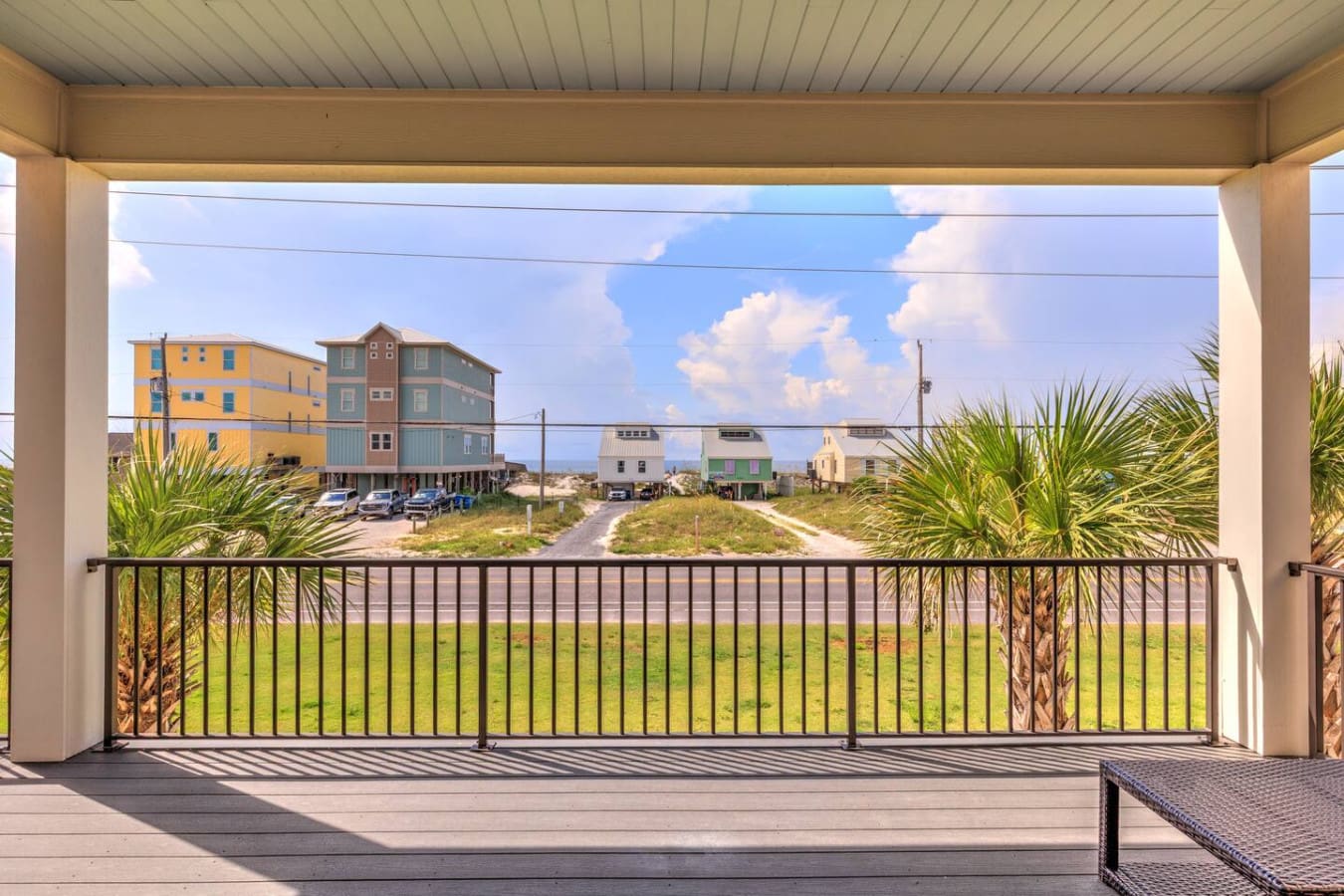 Watching the whole beachside village unfold from your deck like you've got the best seat in the house—this is what vacation mornings are made of.