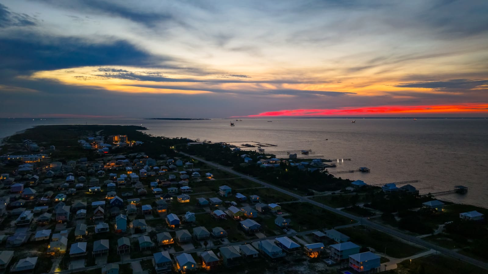 A breathtaking sunset view from above—your beach escape in full color.