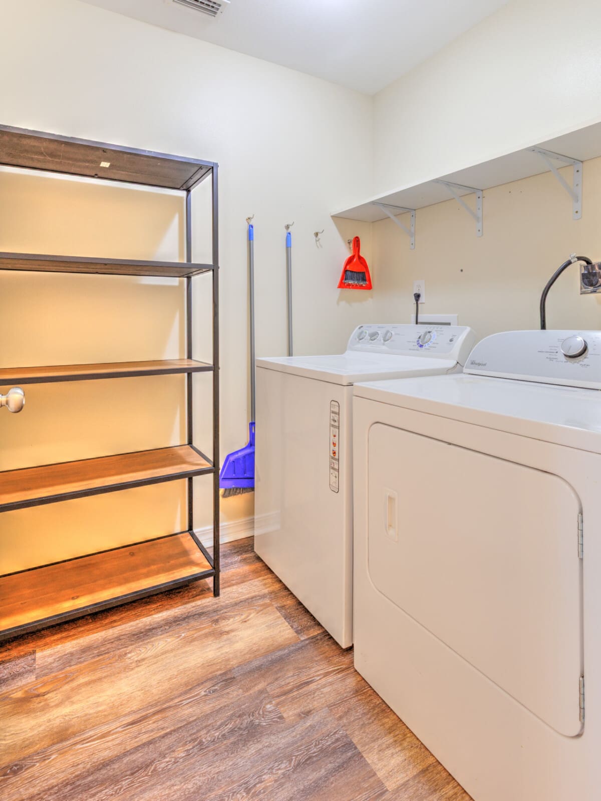 A clean and tidy space to wash, dry, and go.