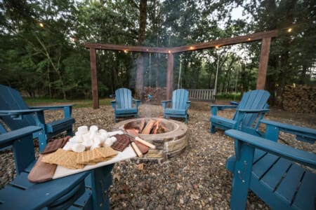 A smores-firepit-cabin-woods-chairs.jpg