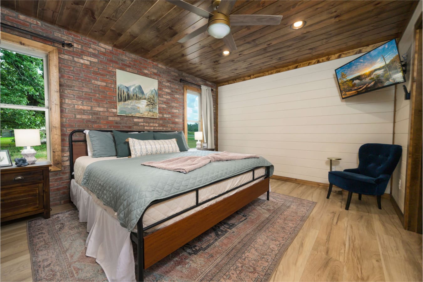 A cozy-cabin-bedroom-brick-wood.jpg