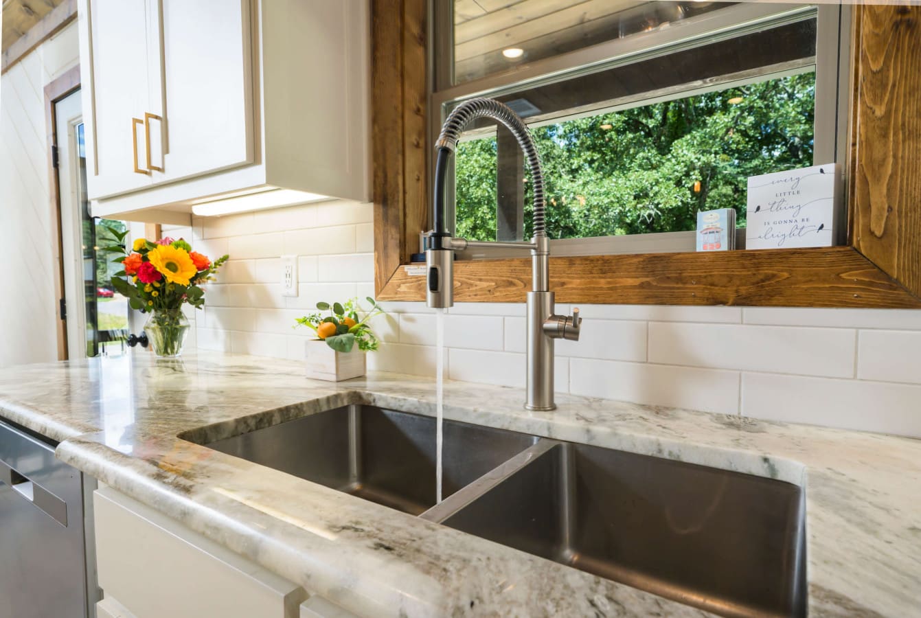 A sunlit-sink-with-flowers-and-reassurance.jpg