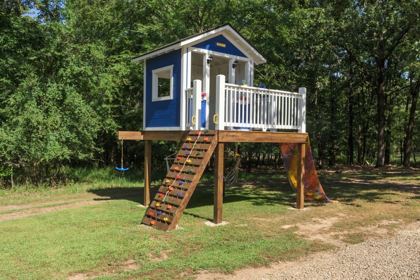 A blue-playhouse-woods-slide-climb.jpg