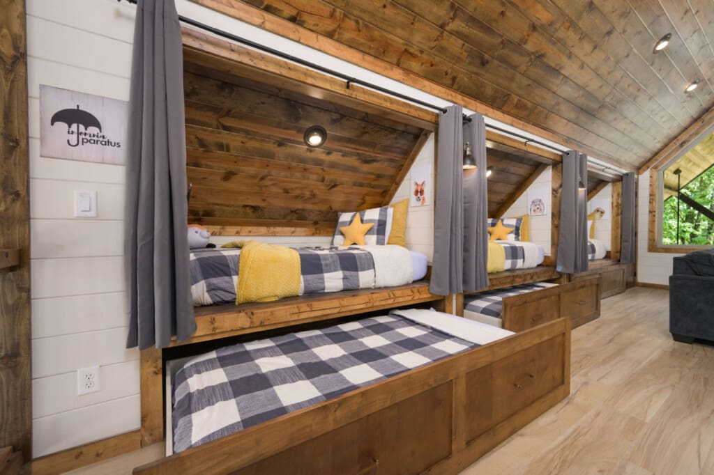 A starry-bunks-beneath-sloped-cabin-ceiling.jpg