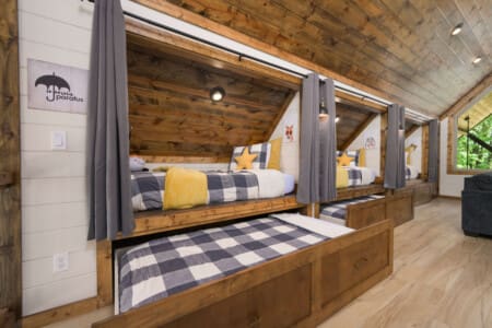 A starry-bunks-beneath-sloped-cabin-ceiling.jpg