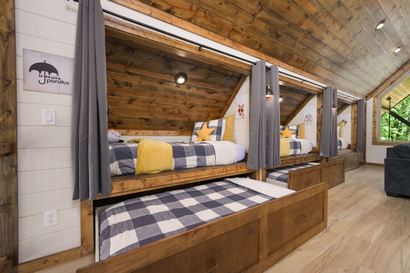 A starry-bunks-beneath-sloped-cabin-ceiling.jpg