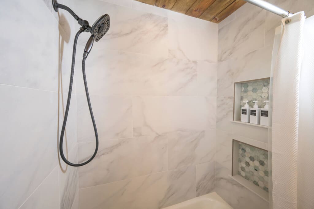 A cabin-shower-marble-rainfall-spa.jpg
