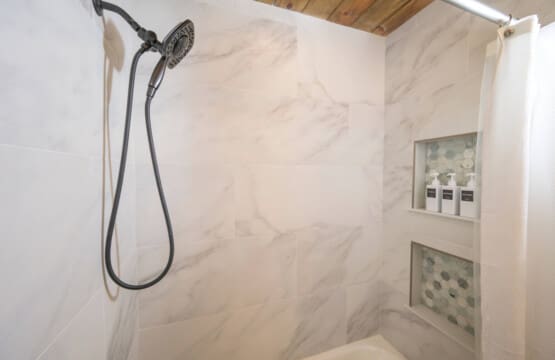 A cabin-shower-marble-rainfall-spa.jpg