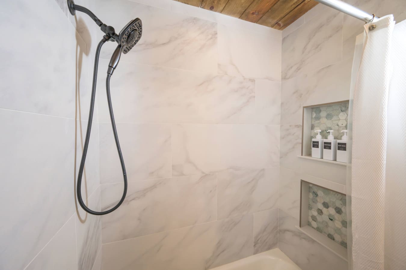 A cabin-shower-marble-rainfall-spa.jpg