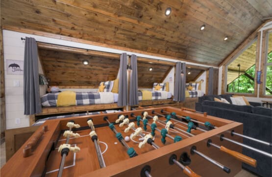 A plaid-bunks-foosball-forest-views-inside.jpg