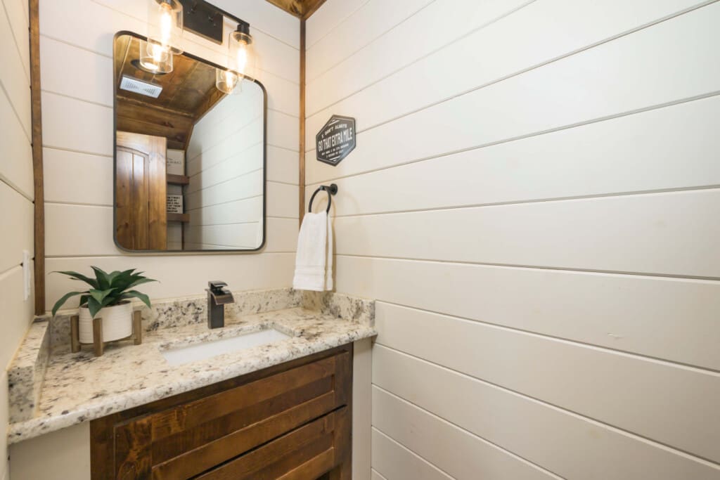 A rustic-cabin-bathroom-shiplap-vanity.jpg