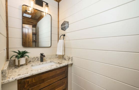 A rustic-cabin-bathroom-shiplap-vanity.jpg