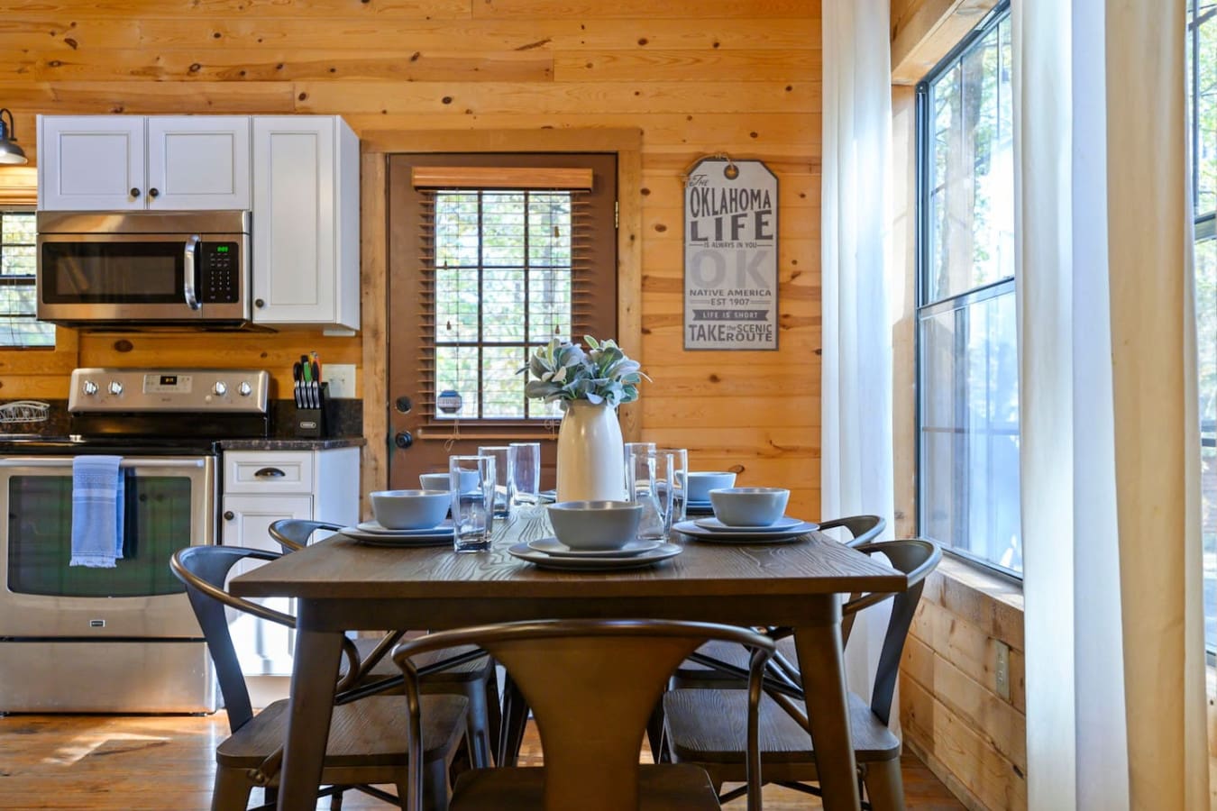 Set the table and enjoy a beautifully arranged dining space, ready for comfortable and enjoyable meals.