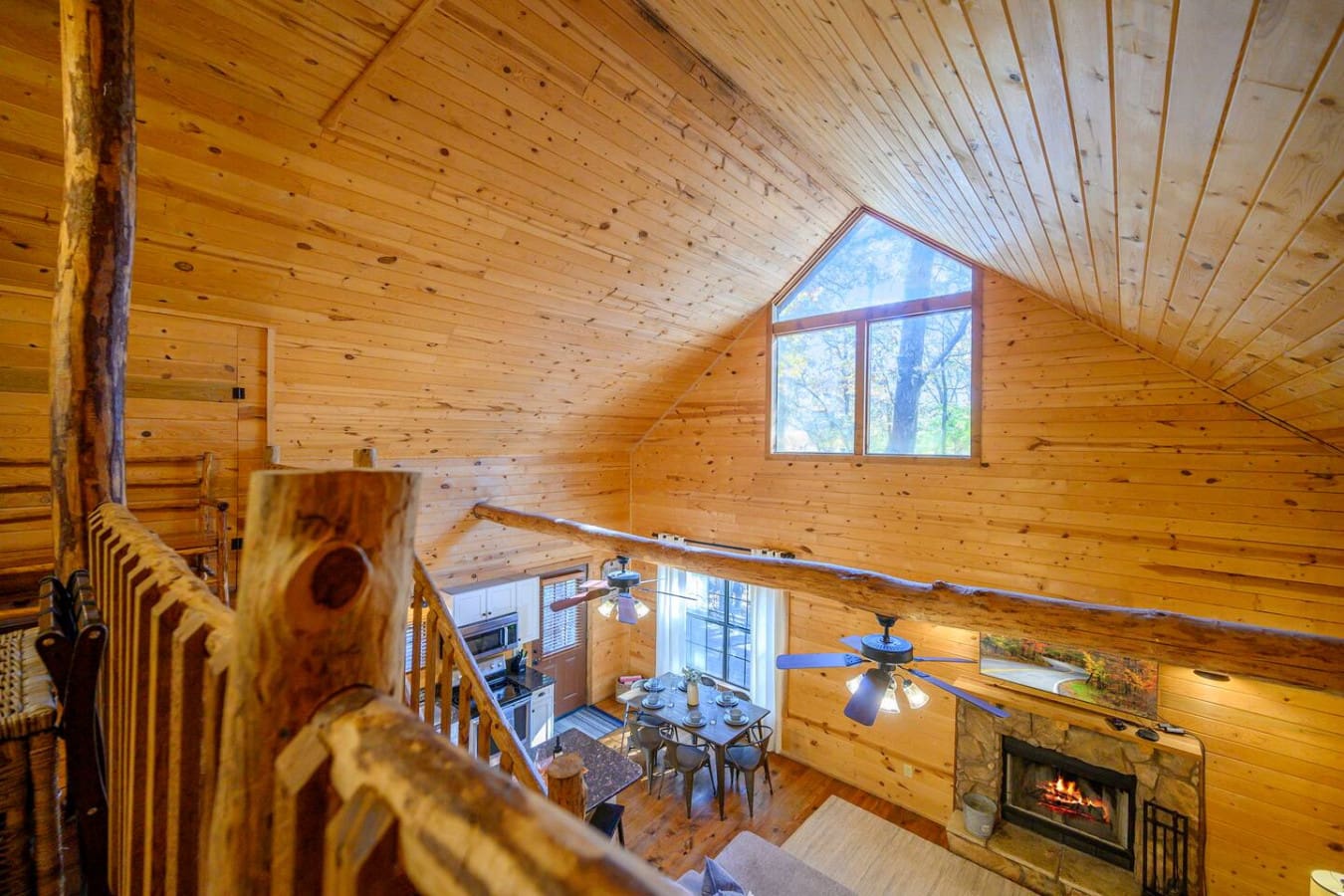 Enjoy beautiful views from upstairs, where large windows and open sightlines showcase the surrounding scenery.