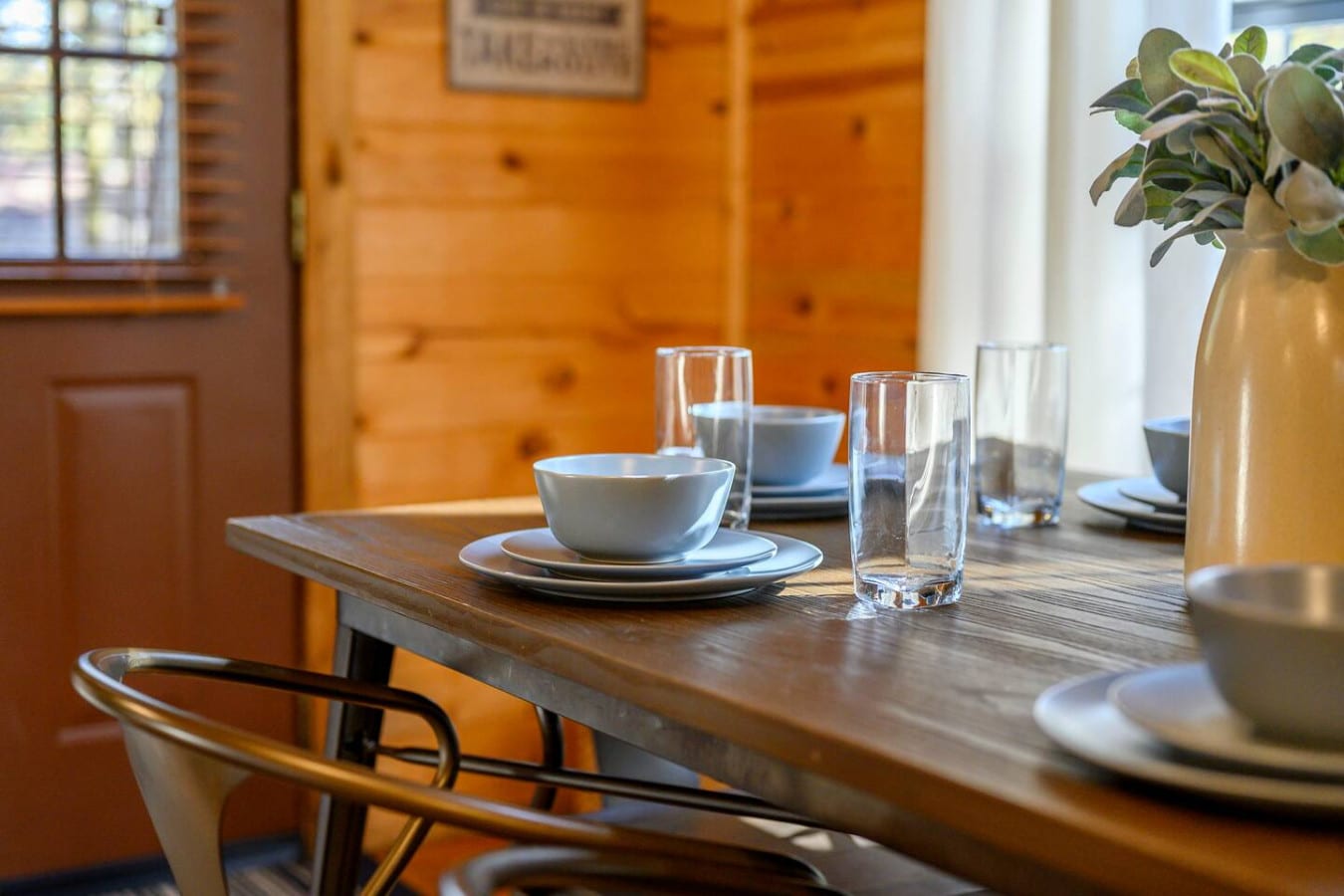 Plates and bowls provided for convenient dining, making it easy to enjoy meals during your stay.