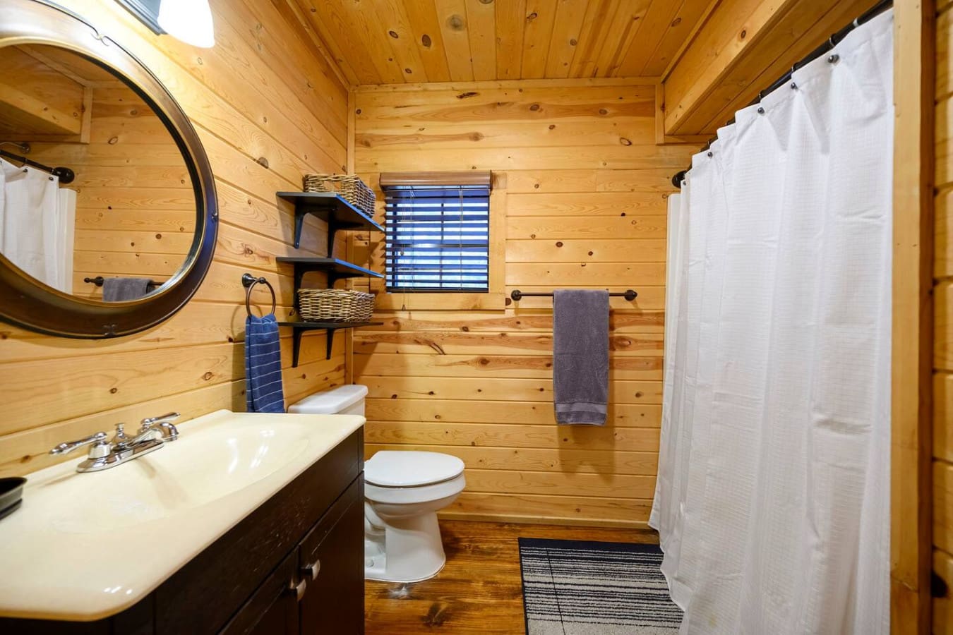 Modern bathroom designed for comfort and convenience, offering a clean and relaxing space to refresh during your stay.