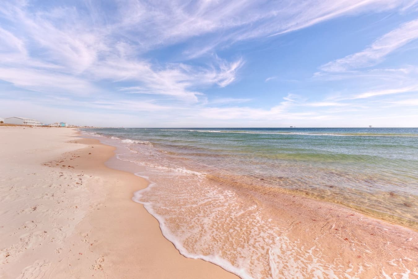 Wake up to this endless stretch of sandy shoreline and gentle waves that basically invite you to spend your whole day just walking, swimming, and soaking up that peaceful beachfront vibe.