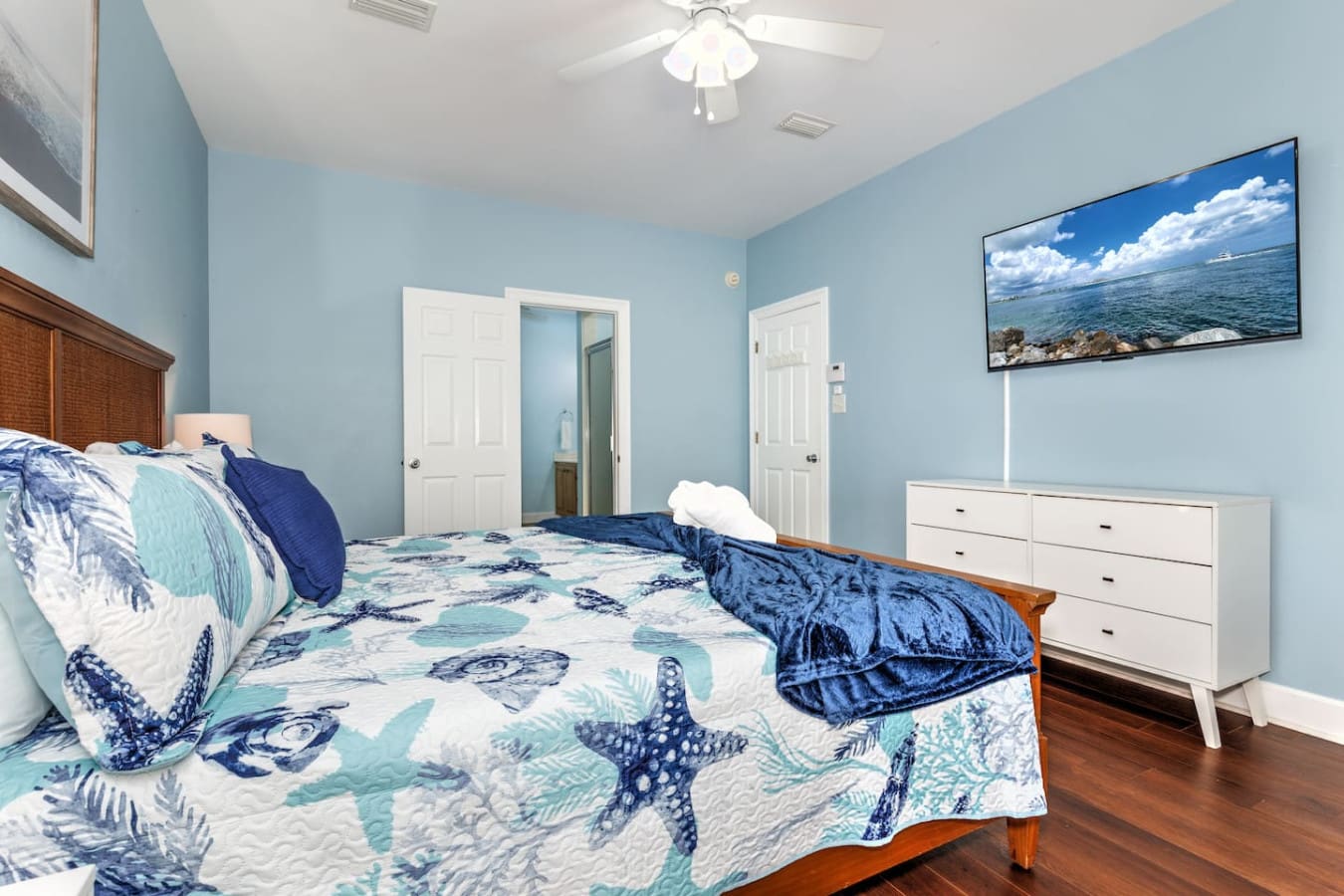 This bright, breezy bedroom has all the coastal vibes you need with that fun sea-life bedding and ocean views right on the TV to keep the beach theme going strong.